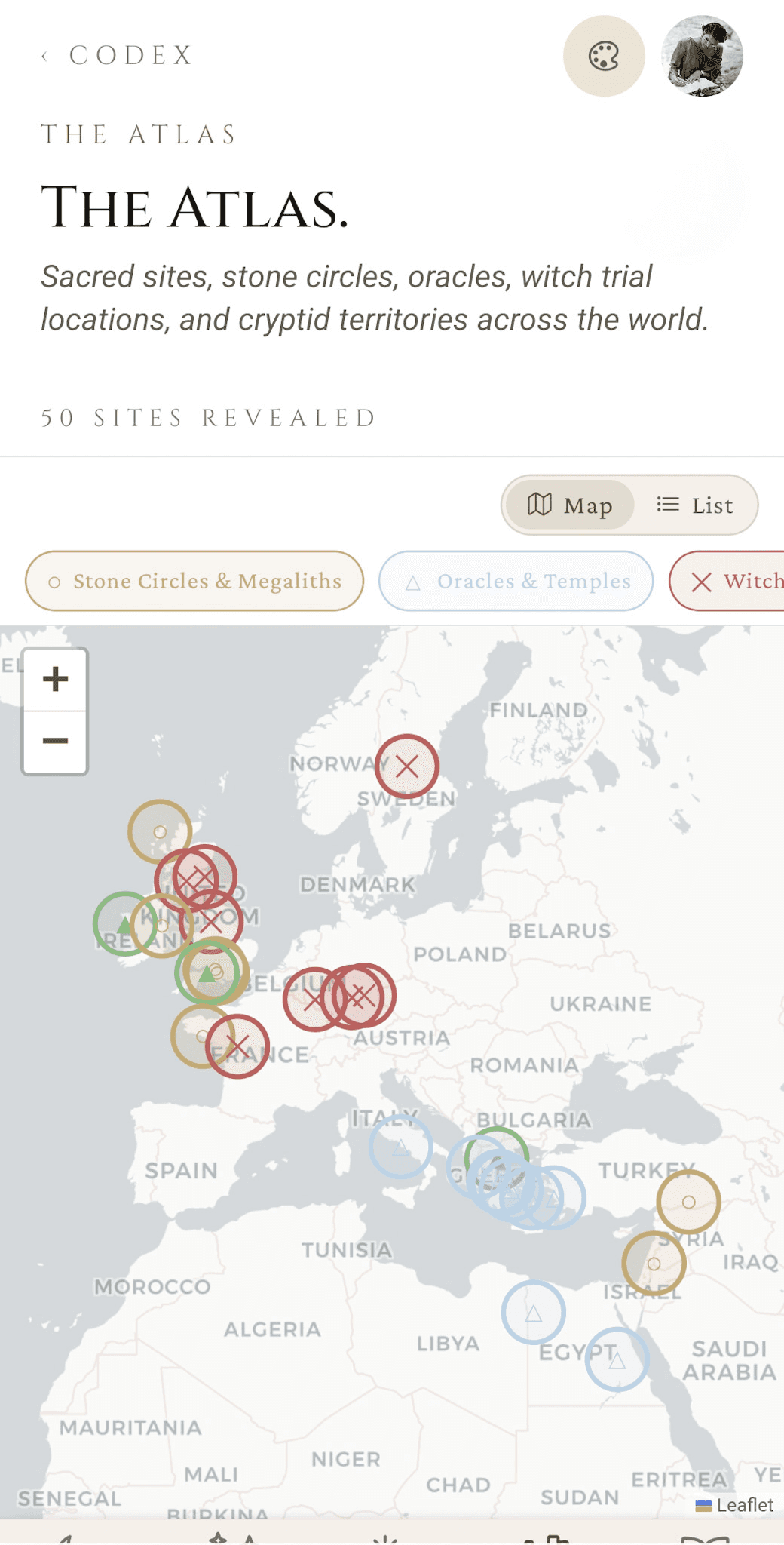 The Atlas — map view of fifty sites with category filter chips (Stone Circles & Megaliths, Oracles & Temples, Witch...) and coloured pins clustered across Europe and the Mediterranean